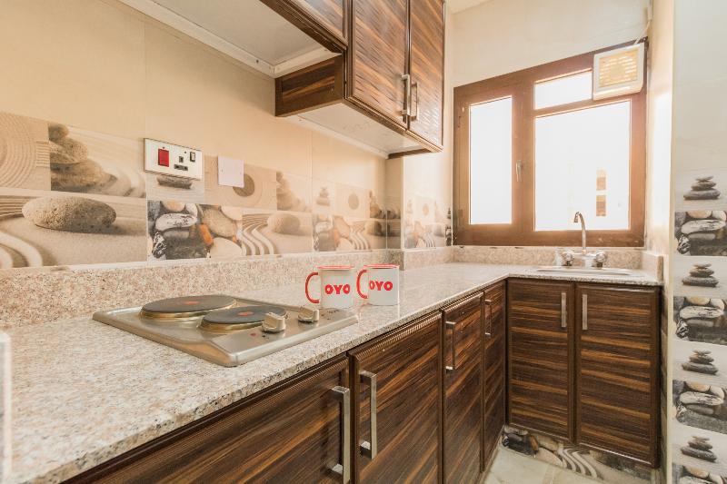 OYO 106 Muscat Grand Hotel Apartment - Oda
