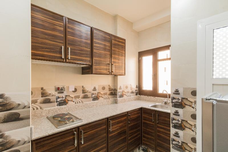 OYO 106 Muscat Grand Hotel Apartment - Oda