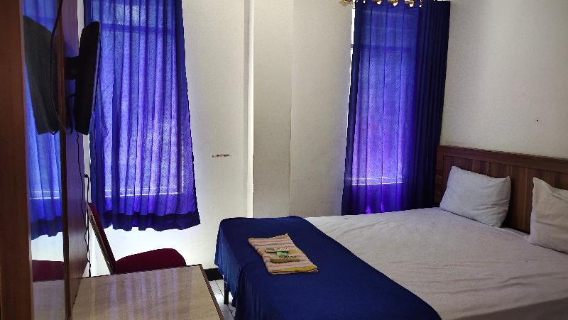 De' Premium Hotel Musi Raya - Oda