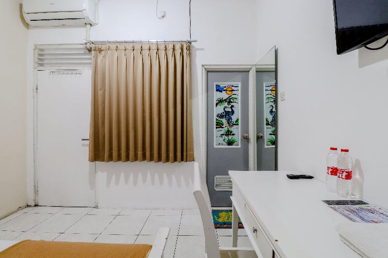 Ratu Guesthouse by ZUZU - Oda