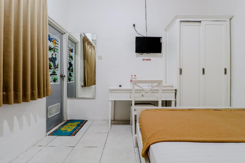 Ratu Guesthouse by ZUZU - Oda