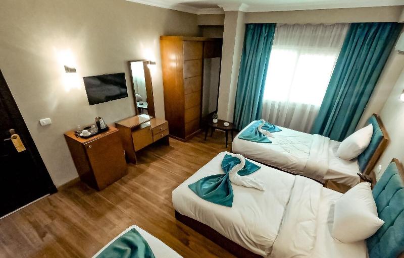 Pyramids Oasis Hotel - Oda