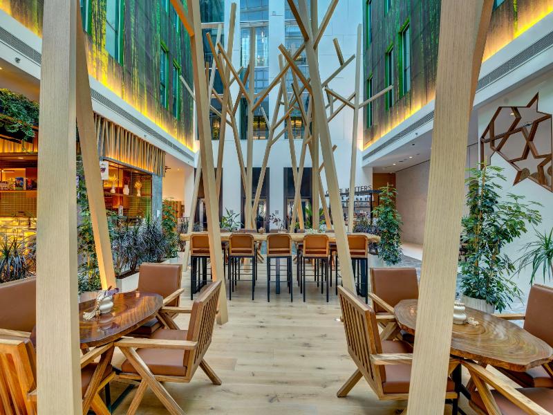 Al Khoory Courtyard Hotel - Restoran