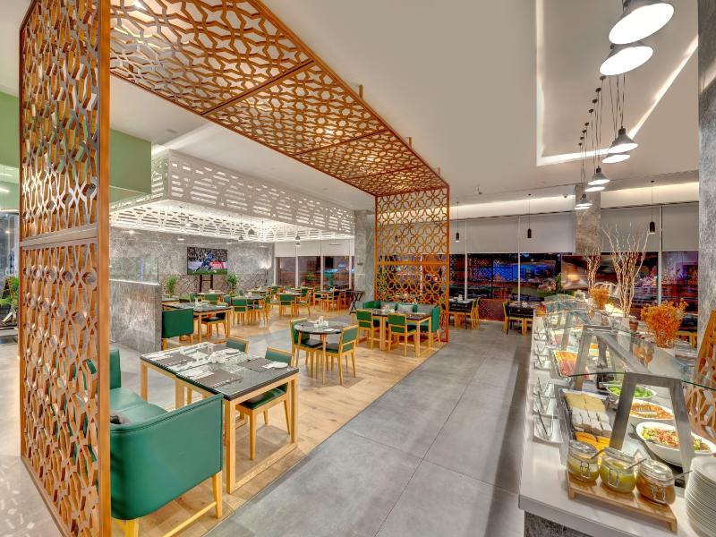 Al Khoory Courtyard Hotel - Restoran