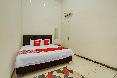 OYO 90684 Happy Homestay Syariah oda fotoğrafı