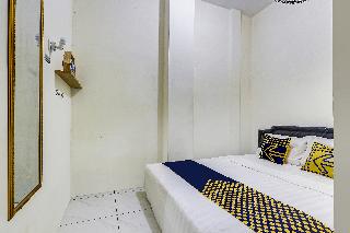 SPOT ON 90780 Gang Tengah Homestay Syaria fotoÄŸrafÄ±