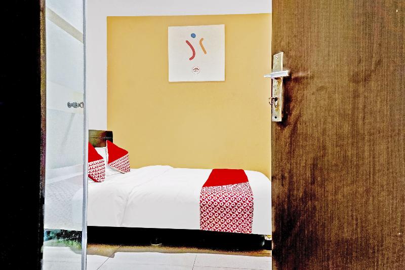 Super OYO 90692 Point Hostel - Oda