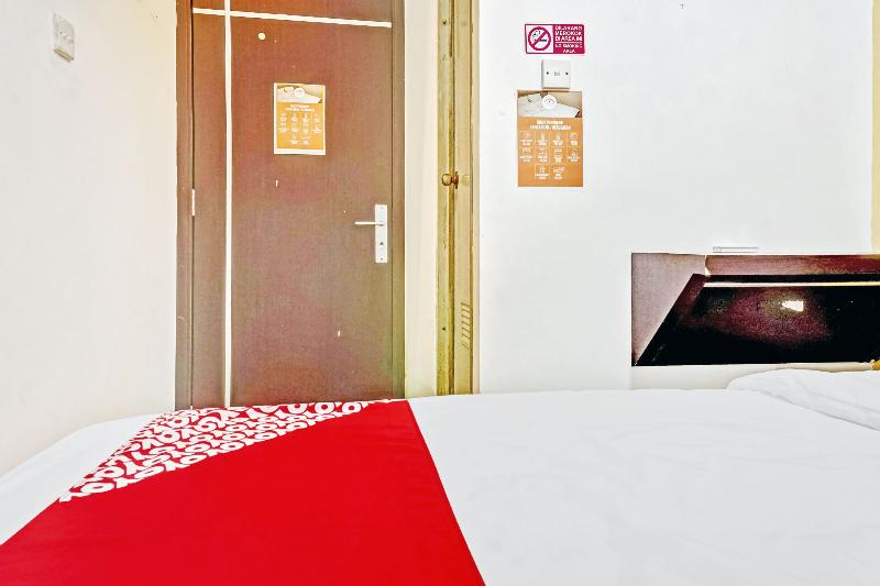Super OYO 90692 Point Hostel - Oda