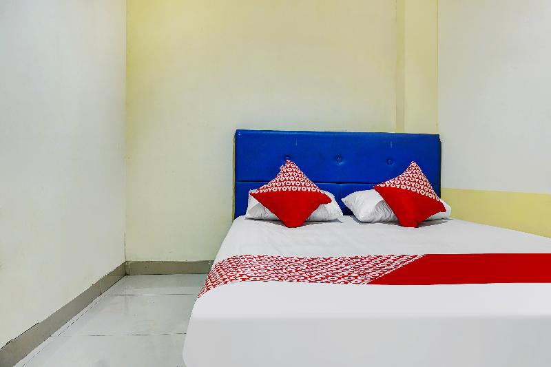 OYO 91182 Kos'ta Homestay Makassar - Oda