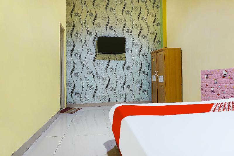 OYO 91182 Kos'ta Homestay Makassar - Oda
