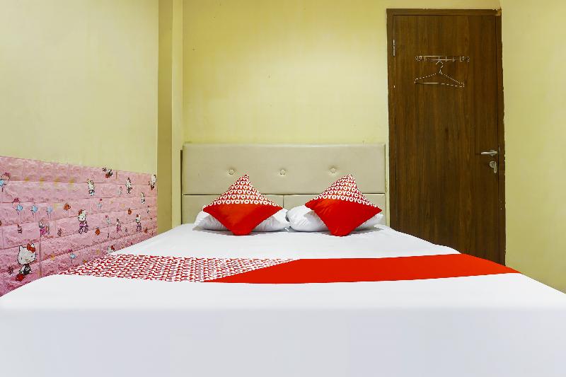 OYO 91182 Kos'ta Homestay Makassar - Oda