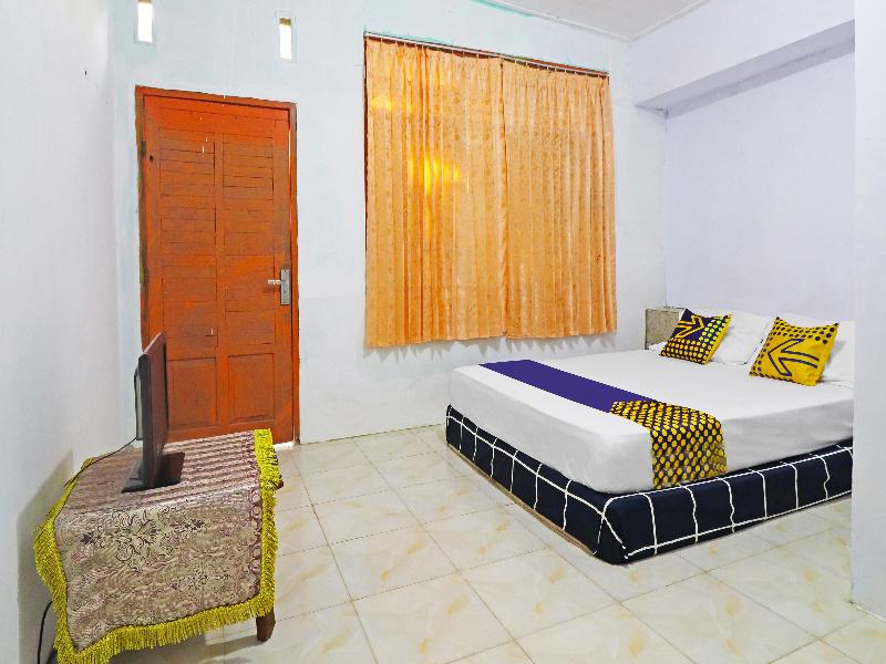 SPOT ON 91222 Kanjeng Mami Homestay Syaria - Oda