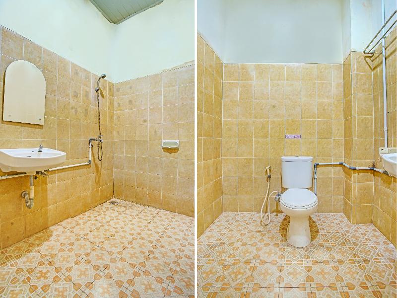 OYO 90947 Hotel Sarbini - Oda
