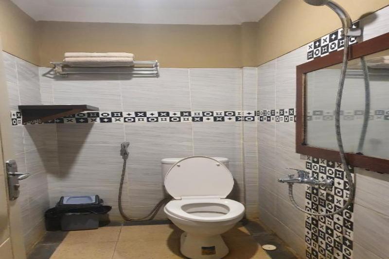OYO 91097 Hotel Atika - Oda