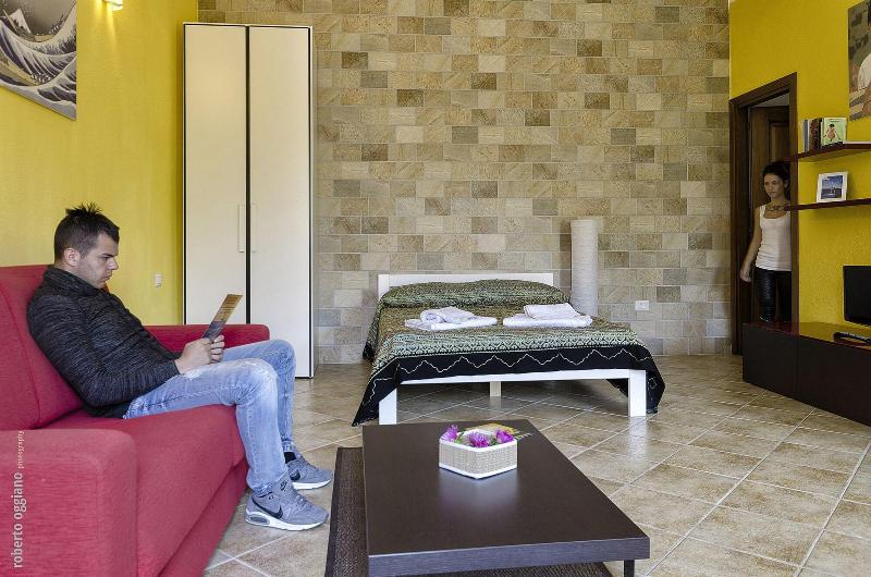 Residence L'Isola Surf House - Oda