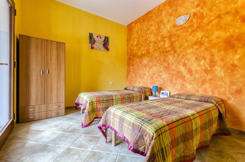 Residence L'Isola Surf House - Oda