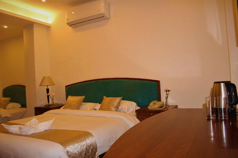 New MerryLand Hotel - Oda