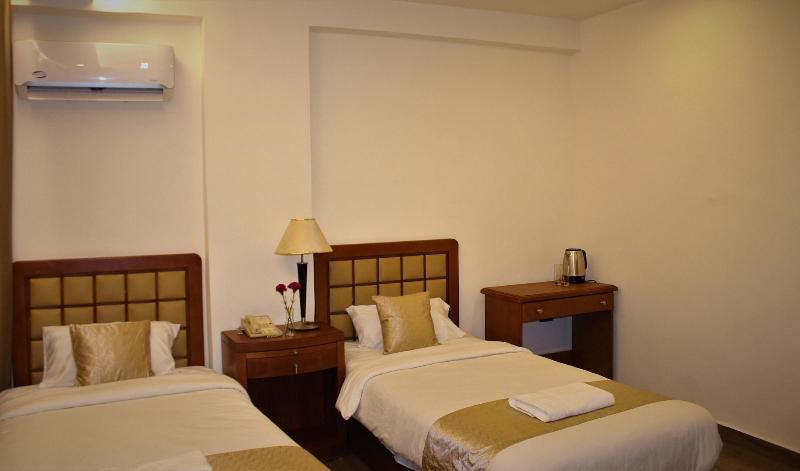 New MerryLand Hotel - Oda