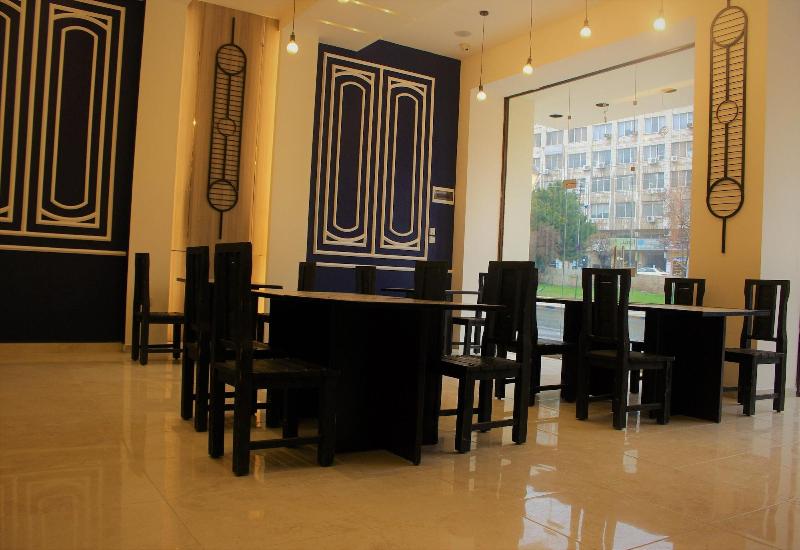 New MerryLand Hotel - Restoran