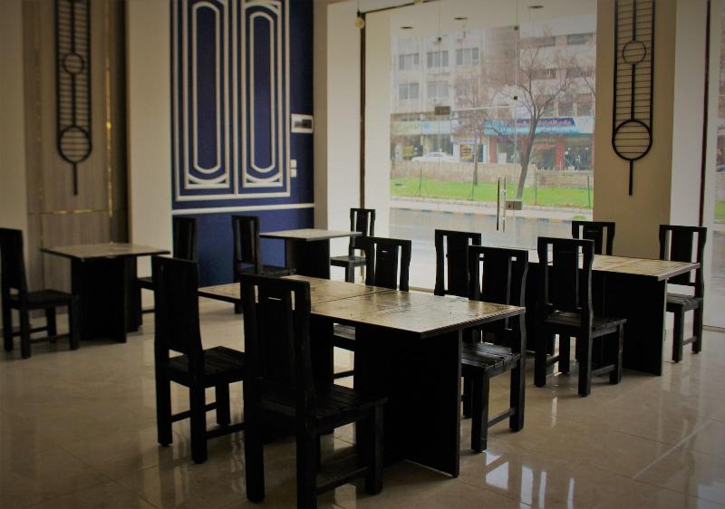 New MerryLand Hotel - Restoran