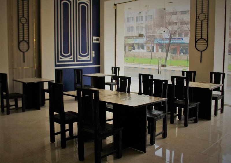 New MerryLand Hotel - Restoran