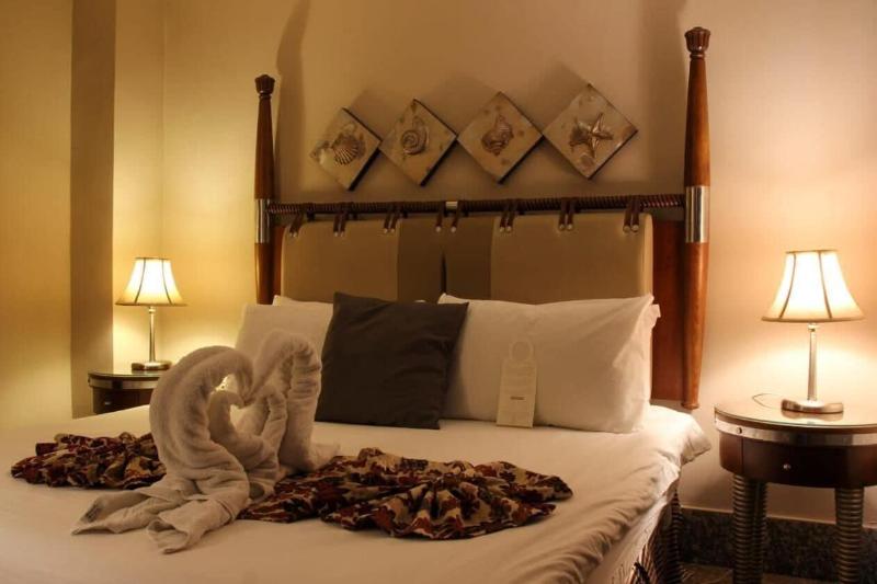 Capri Hotel Suites - Oda