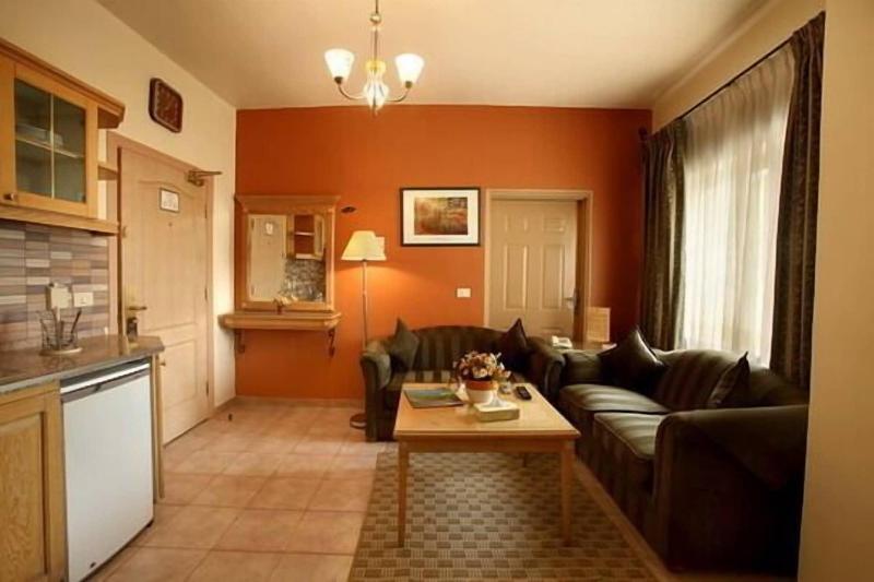 Capri Hotel Suites - Oda