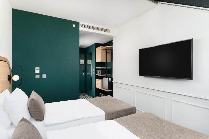 Hotel Oktogon Haggenmacher by Continental Group - Oda
