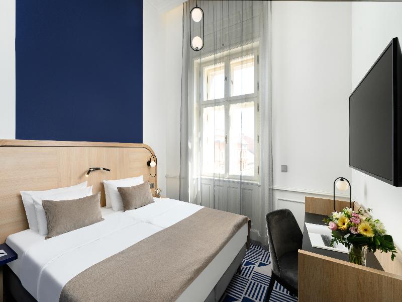 Hotel Oktogon Haggenmacher by Continental Group - Oda
