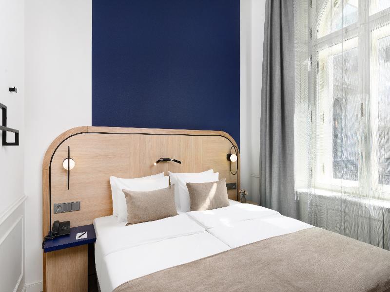 Hotel Oktogon Haggenmacher by Continental Group - Oda