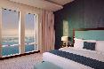 Wyndham Grand Doha West Bay beach oda fotoğrafı