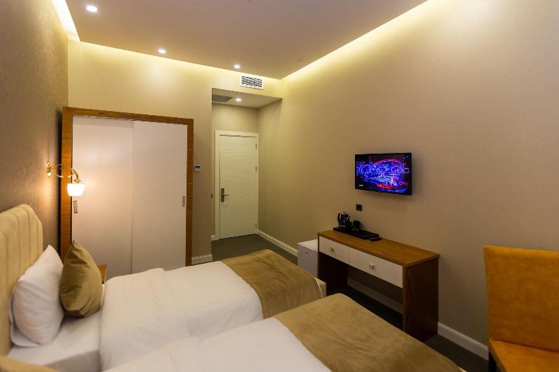 Aksent Hotel - Oda