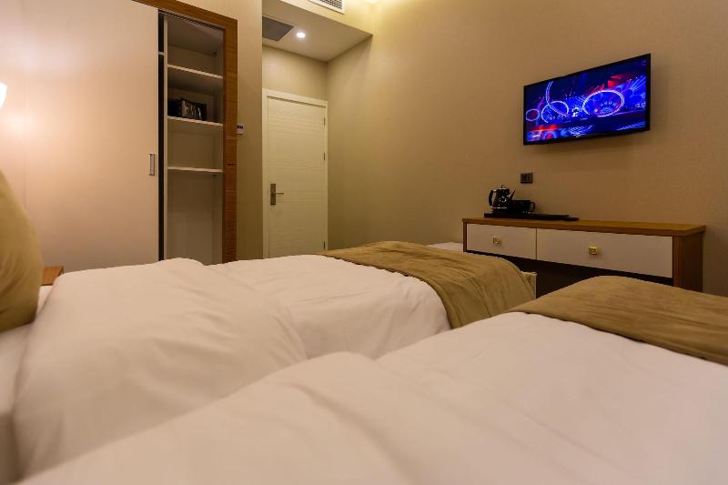 Aksent Hotel - Oda