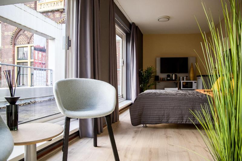 The Happy Traveler - Guesthouse Groningen - Oda