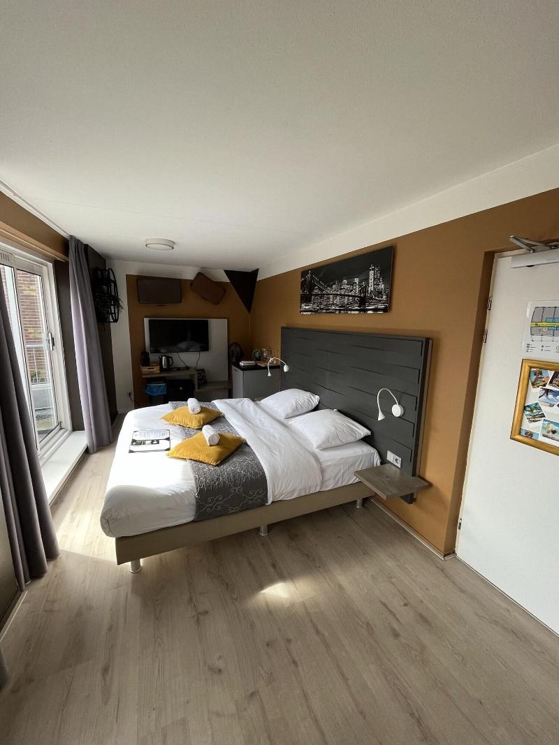 The Happy Traveler - Guesthouse Groningen - Oda