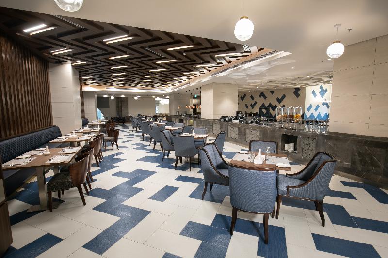Wirgan Hotel Al Aziziyah - Restoran