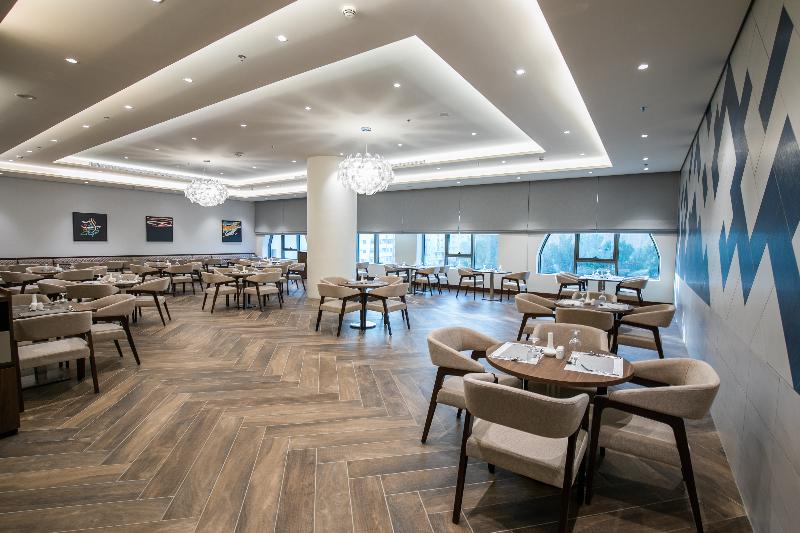 Wirgan Hotel Al Aziziyah - Restoran