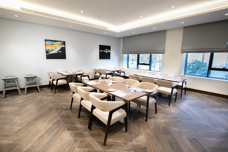 Wirgan Hotel Al Aziziyah - Restoran