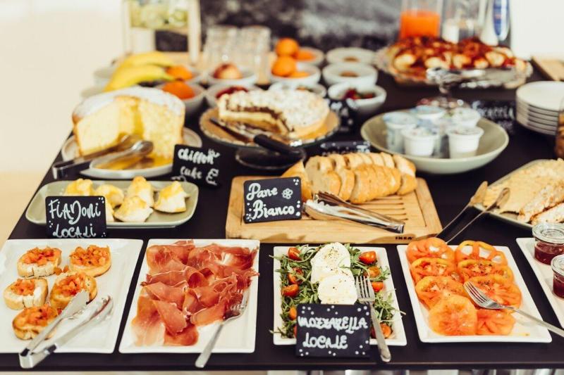 Marina Gardens Boutique & Suites - Restoran