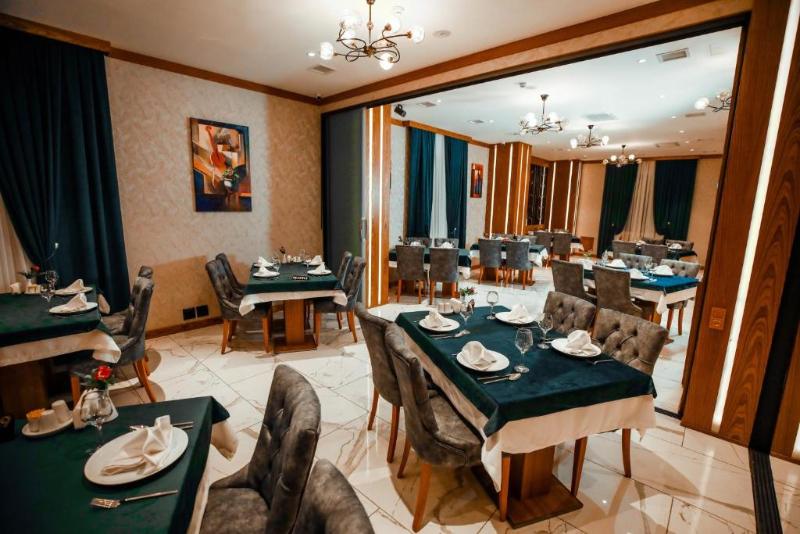 Regal Inn Badamdar Hotel - Restoran