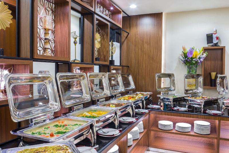 Al Malqa Elite Hotel - Restoran