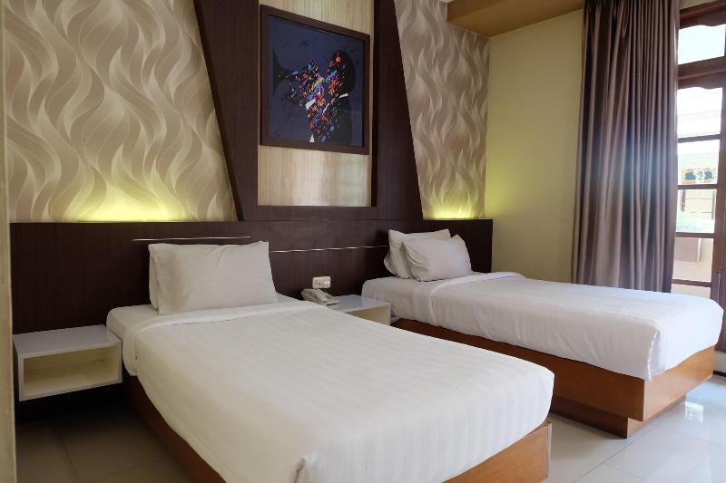 Votel Kartika Abadi Hotel Madiun - Oda