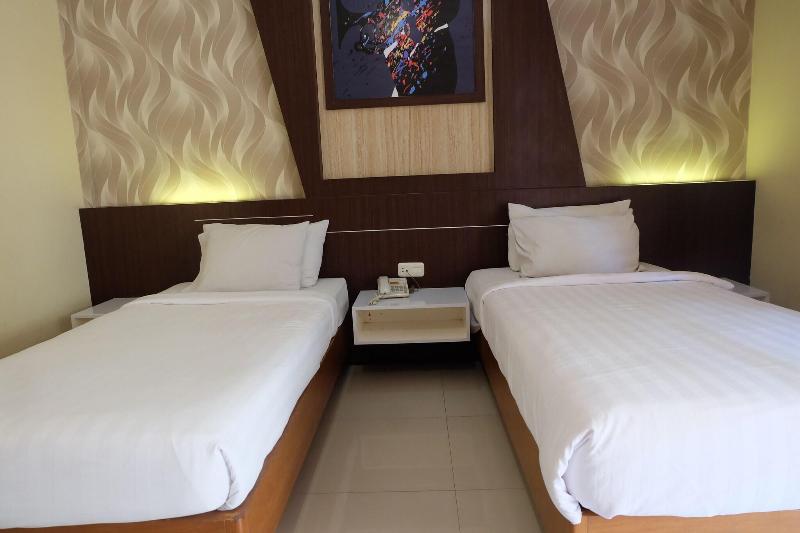Votel Kartika Abadi Hotel Madiun - Oda