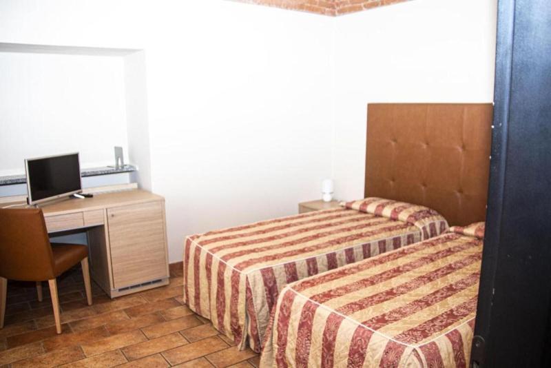 Hotel Tornielli 9 - Oda