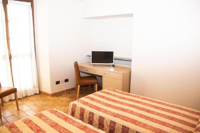 Hotel Tornielli 9 - Oda