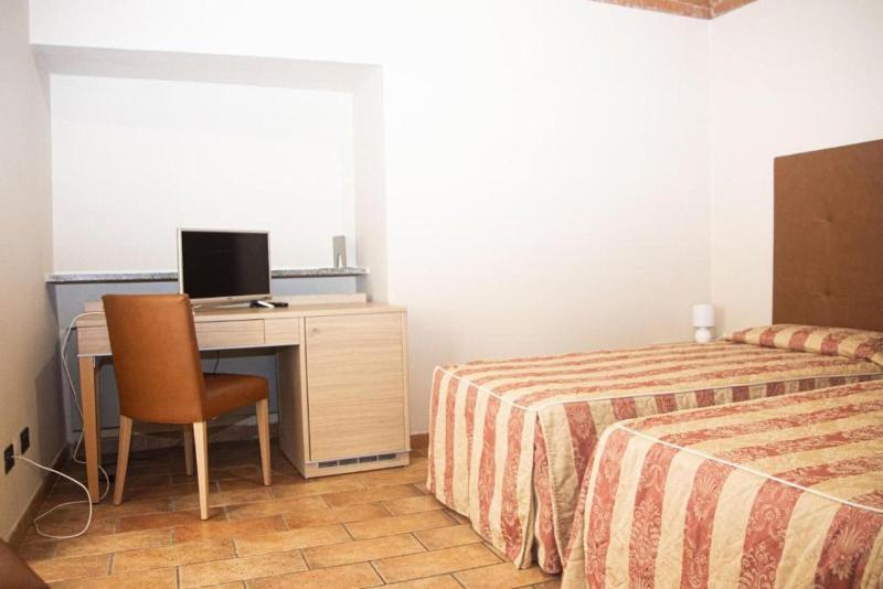 Hotel Tornielli 9 - Oda