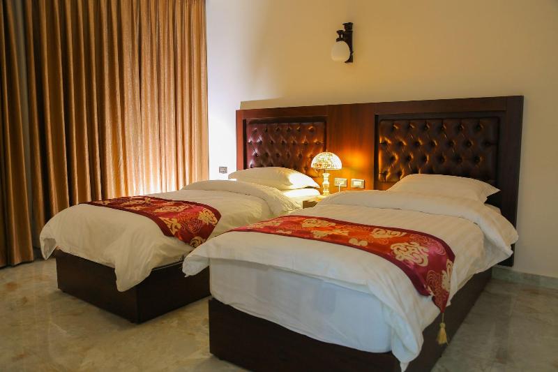 Qaser Alsultan Hotel Suites - Oda
