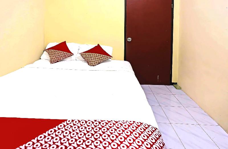 Spot On 91343 Kartika Guest House Syariah - Oda