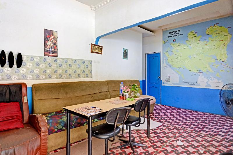 Spot On 91500 Suci Homestay Syariah - Lobi