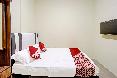 Spot On 91500 Suci Homestay Syariah oda fotoğrafı